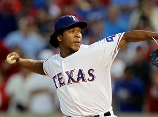 Rangers pitcher Neftali Feliz pitches against the New York Yankees in Game 2 of the ALCS Saturday.